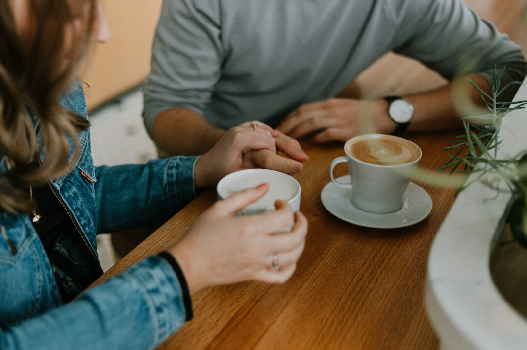 couple drinking coffee in cafe