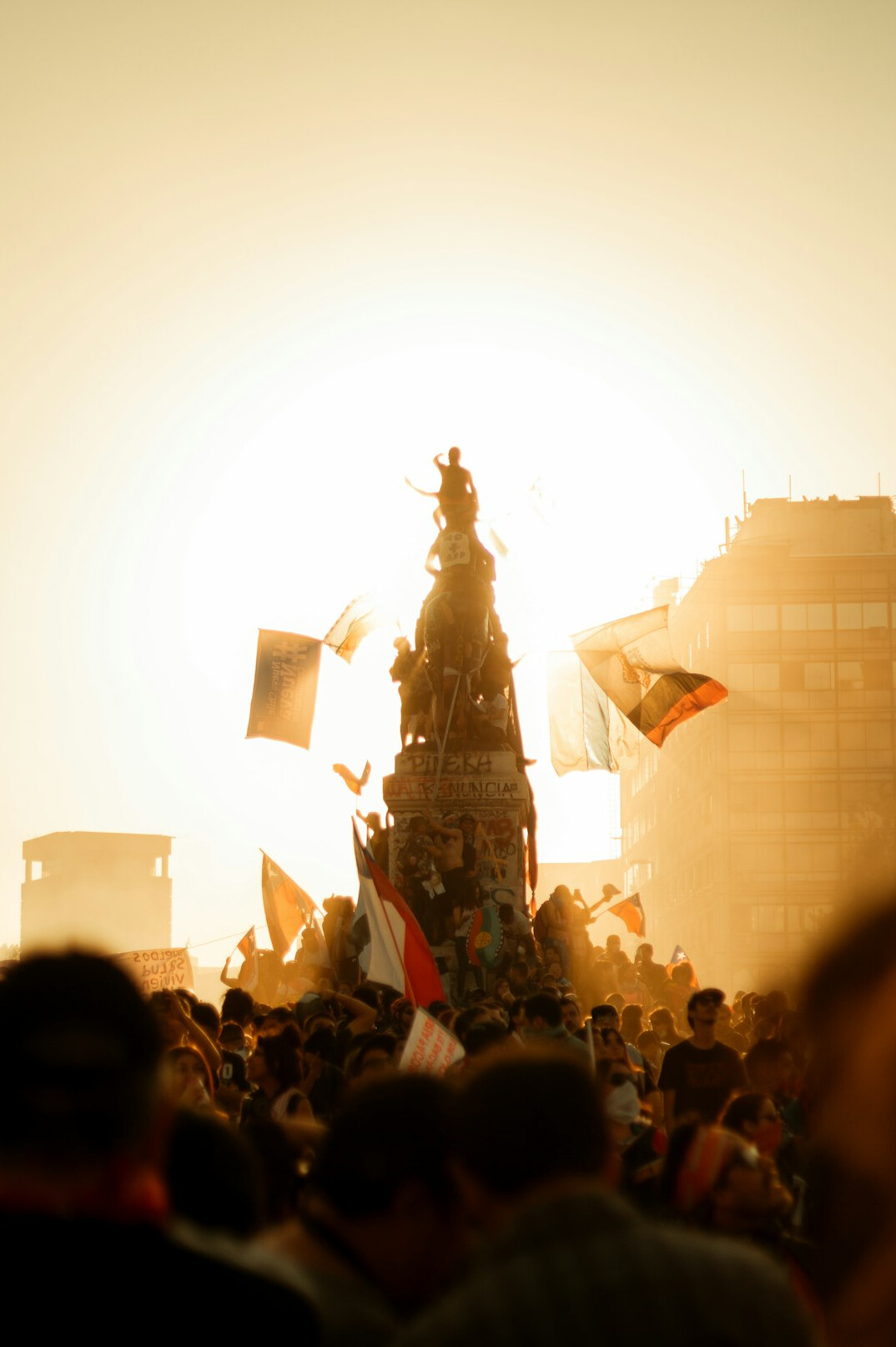 People gathering in a historic plaza in Santiago Chile